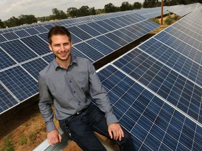 David Amster-Olszewski, founder of SunShare, at one of the "solar gardens" his company built in Colorado