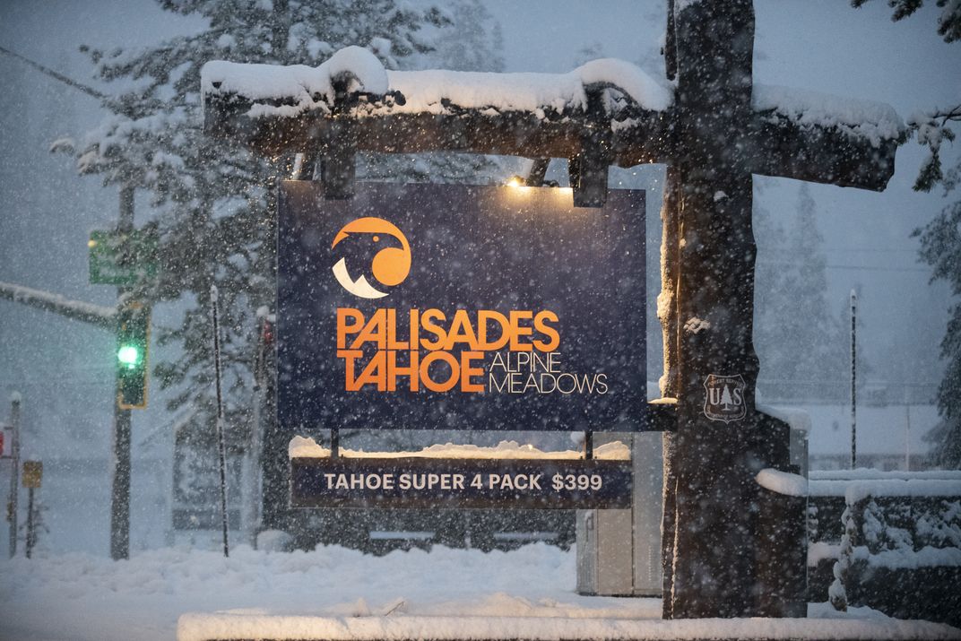 Palisades Tahoe sign with snow