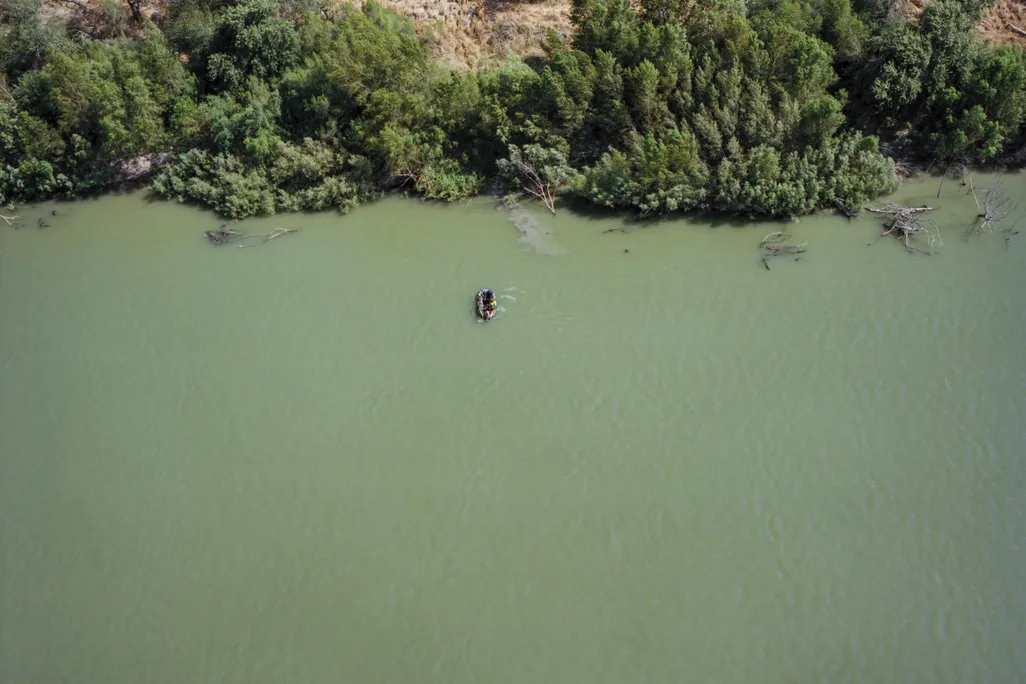 Migrant raft on Rio Grande