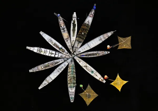 Fisherman and his boats thumbnail