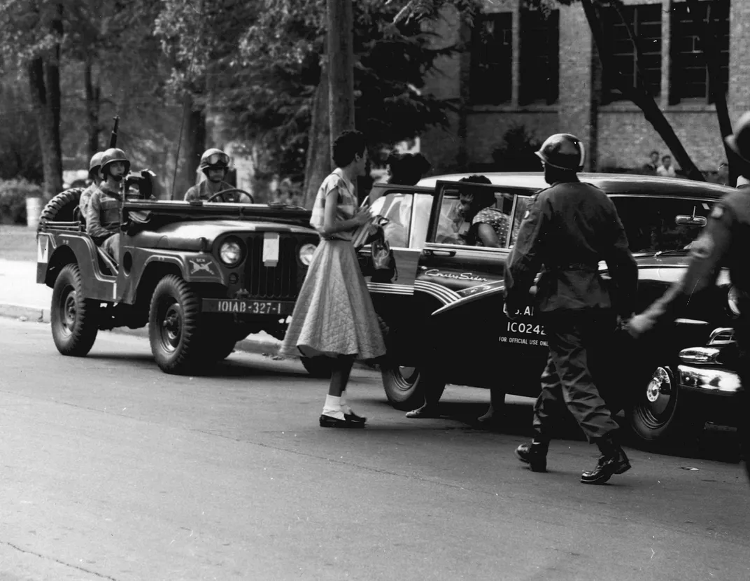 Federal troops escort the Little Rock Nine to school