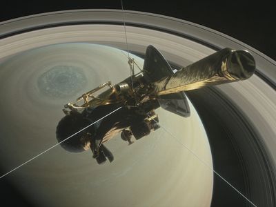 An artist's rendering imagines what Cassini must have looked like as it headed on the first of a series of orbits between Saturn and its rings. 