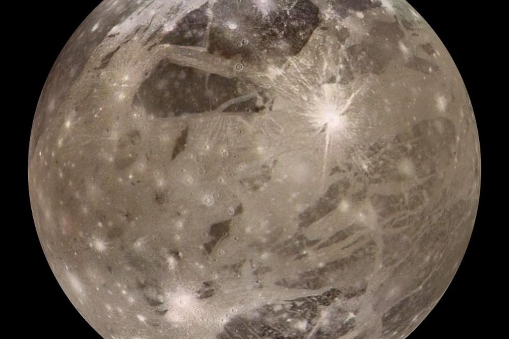 a moon with many crater impacts