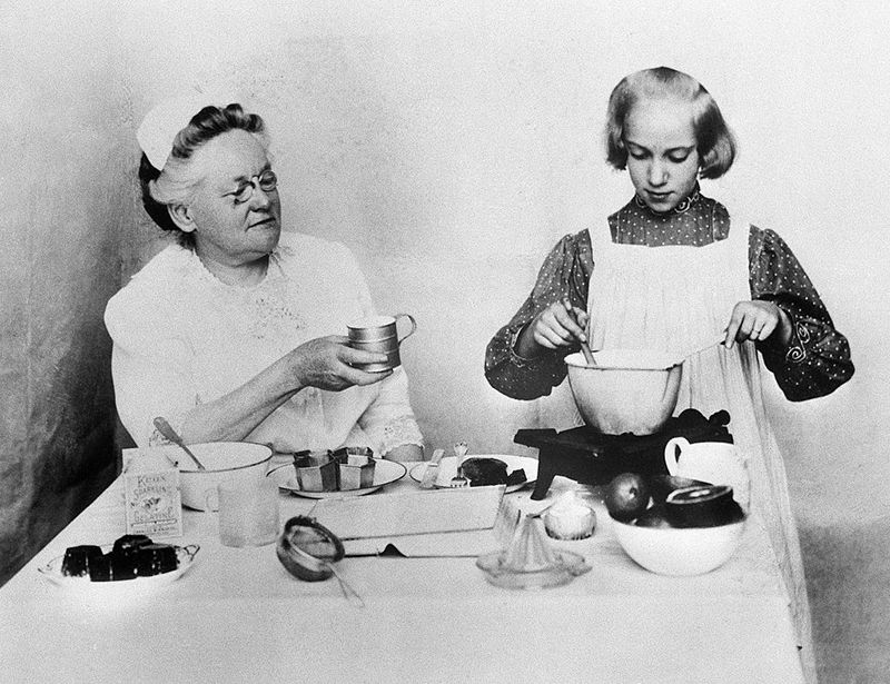 Fannie Farmer watches student cook-main.jpg