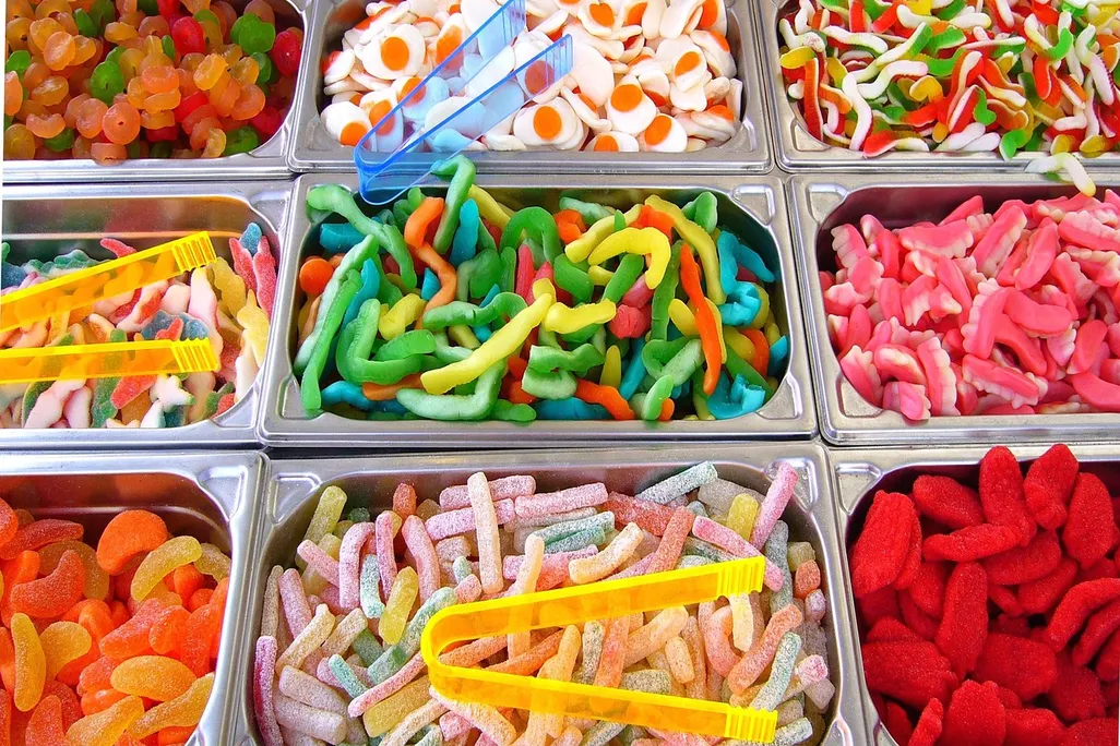 Colorful candies in bins at a candy store