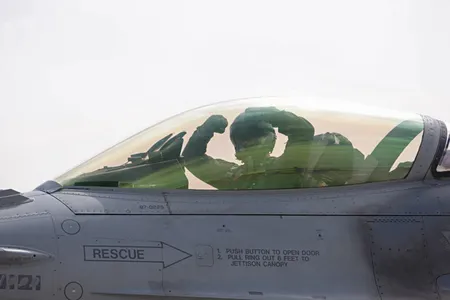 Commander Lt. Col. Tim Conklin "throwing snakes." 