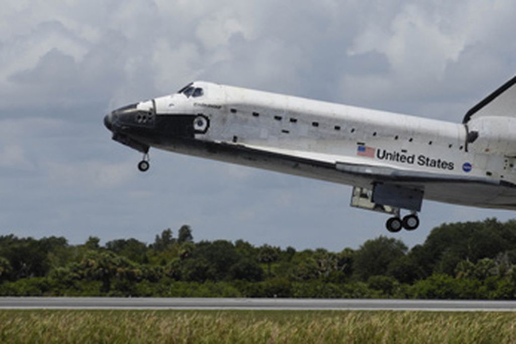 Endeavour returns to Earth after 12 days in space.