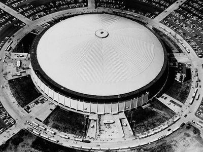 Houston's futuristic Astrodome is home of the first skybox and an animated scoreboard,150 yards wide.