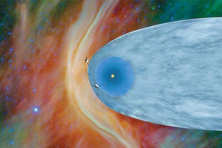 An artist’s concept shows NASA’s two Voyager spacecraft sailing beyond our solar bubble into interstellar space.