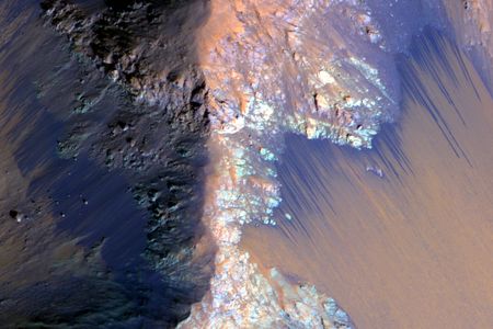 Recurring Slope Lineae (RSL) appear as dark streaks on the slopes of Coprates Chasma on Mars. 