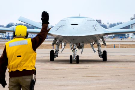 Boeing conducts an MQ-25 deck handling demonstration at its facility in St. Louis. The U.S. Navy intends to procure eight of the carrier-based drones by 2024.