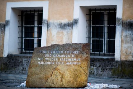 The stone in front of the home in Braunau am Inn, Austria, where Adolf Hitler was born reads "For peace, freedom and democracy, never again fascism, millions of dead are a warning"

 