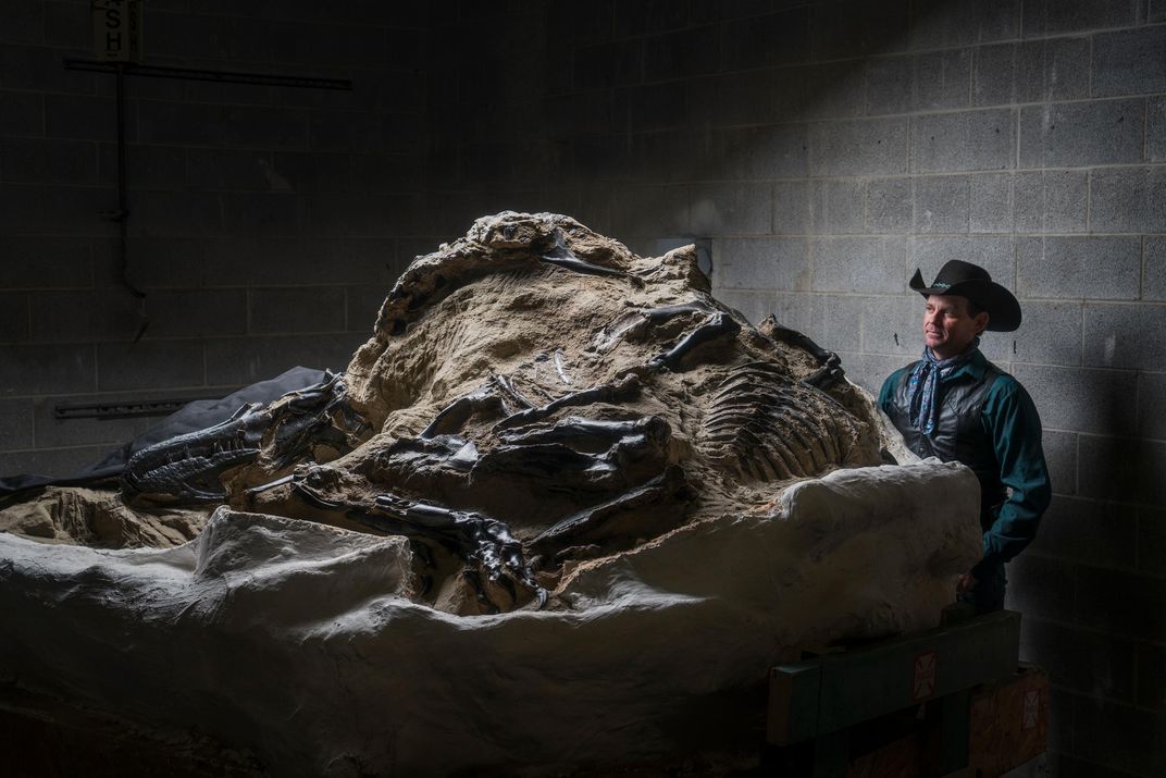 Clayton Phipps, the “Dino Cowboy,” with a section of the Nanotyrannus fossil