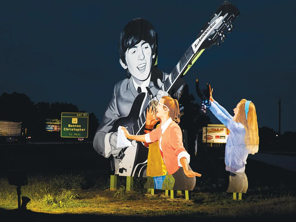SOCIAL MEDIA - A billboard near Benton, Illinois. The rock n roller from Liverpool was un- known in the States when he visited the town in 1963.