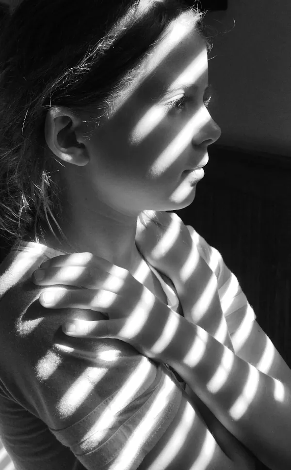 young girl in shadow and light thumbnail