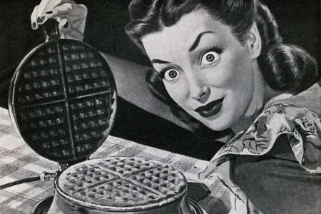 A vintage illustration of a wide-eyed housewife with a waffle in a waffle iron, 1946.