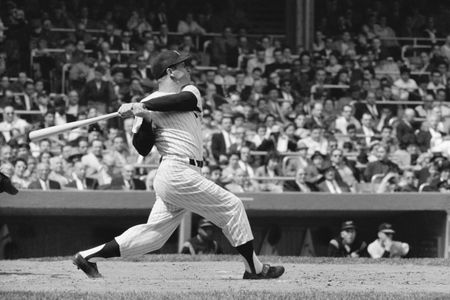 Mickey Mantle of the New York Yankees bats&nbsp;during a game against Baltimore at Yankee Stadium in 1960.
