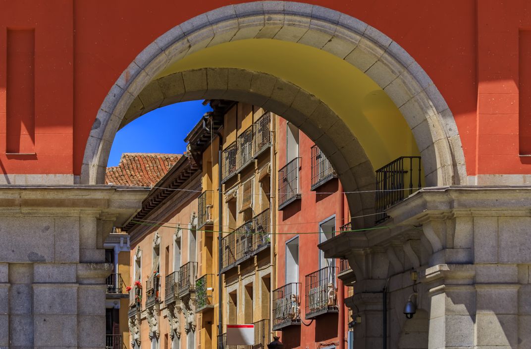 Archway leading from Madrid's Plaza Mayor