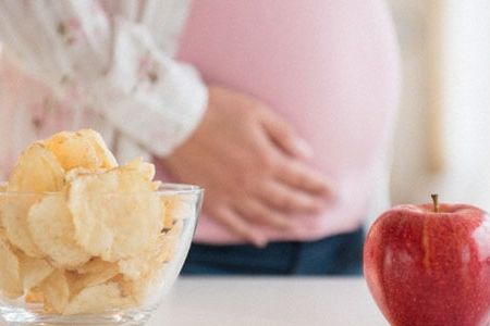 New research suggests that an apple might be the safer choice for pregnant eating.