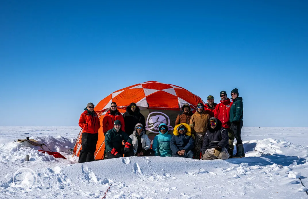 Inuit Guardians and Parks Canada archaeology team members pose for a photo