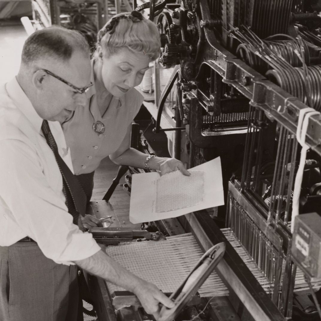 Dorothy Liebes with Ernst Spence at Goodall Fabrics factory in Sanford, Maine, circa 1948