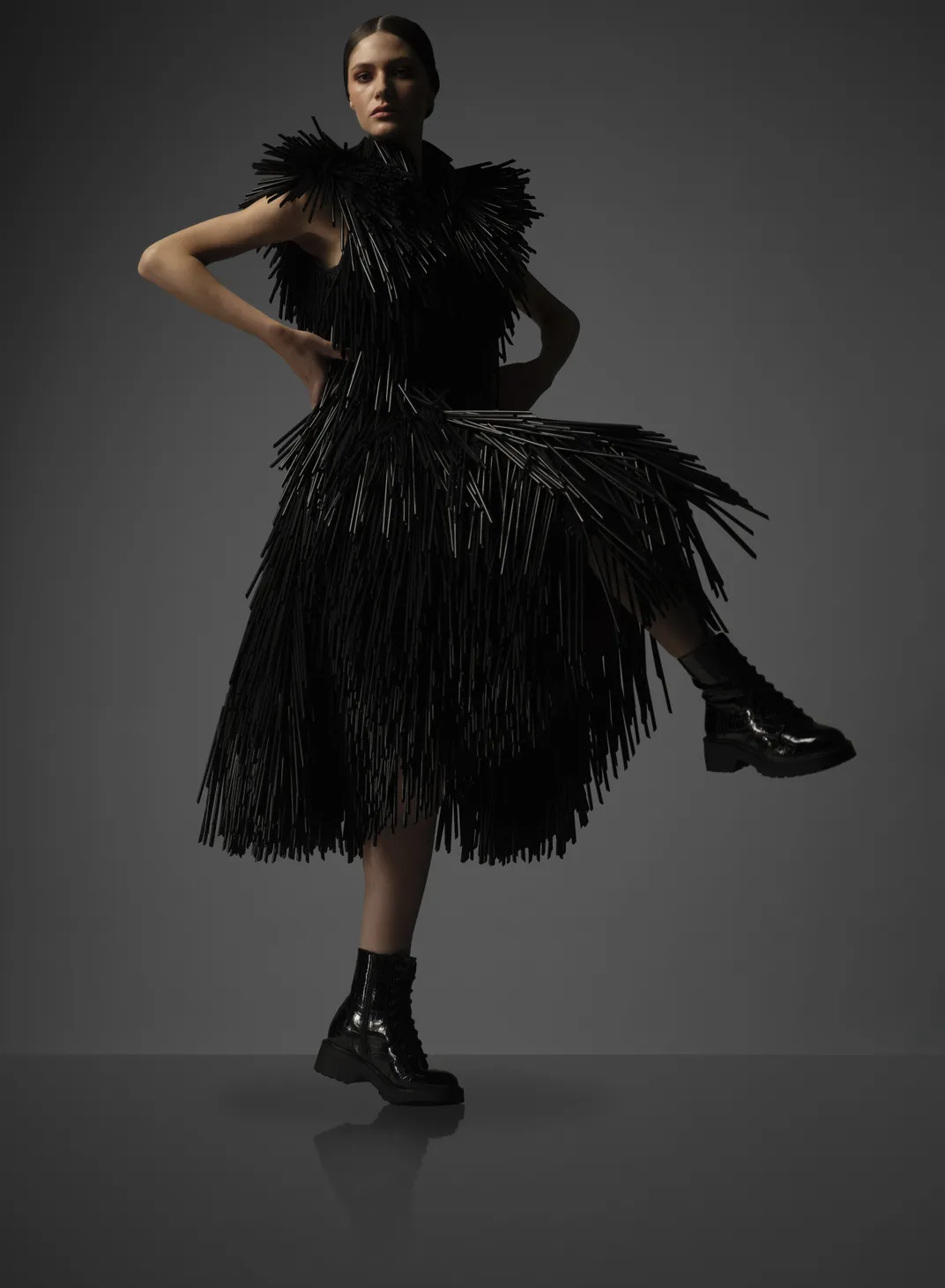 A Gareth Pugh dress embellished with black plastic drinking straws