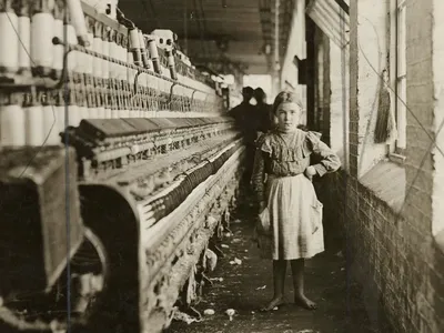 Lewis Wickes Hine&#39;s 1909 photograph of a young spinner in a Georgia cotton mill