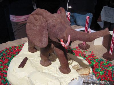 A chocolate model of the African Bush Elephant in the rotunda of the Smithsonian’s National Museum of Natural History on top of a festive holiday cake celebrating the museum. (Smithsonian Institution)