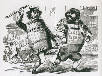 Anti-immigrant cartoon showing two men labeled "Irish Wiskey" and "Lager Bier," carrying a ballot box. 