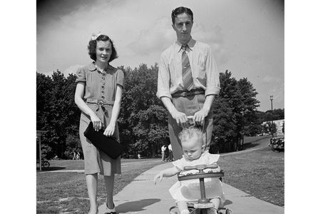 A family practicing the art of sauntering on a Sunday in 1942 in Greenbelt, Maryland.