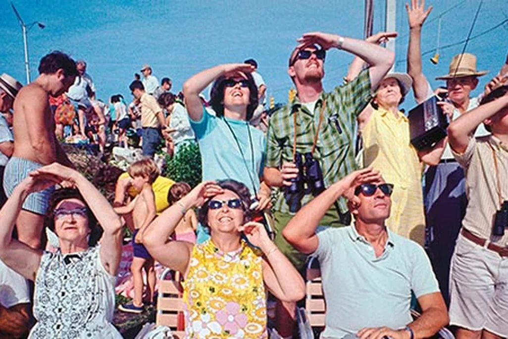 Crowd looking at Apollo 11 launch