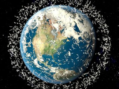 Hundreds of thousands of man-made fragments of debris orbit around the Earth, as depicted here in an illustration of the cosmic mess.