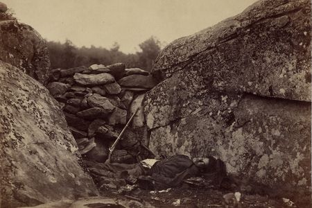 "Home of a Rebel Sharpshooter." A soldier finds his final resting place, July 1863.
