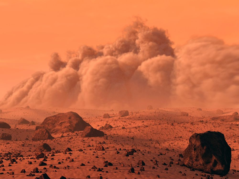 An auburn-colored ominous Martian landscape with a dust cloud rolling in. 