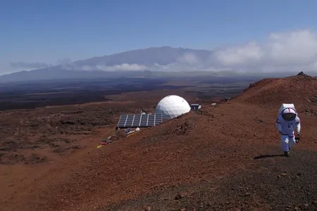 An "astronaut" walks outside of the HI-SEAS dome on Mauna Loa. 