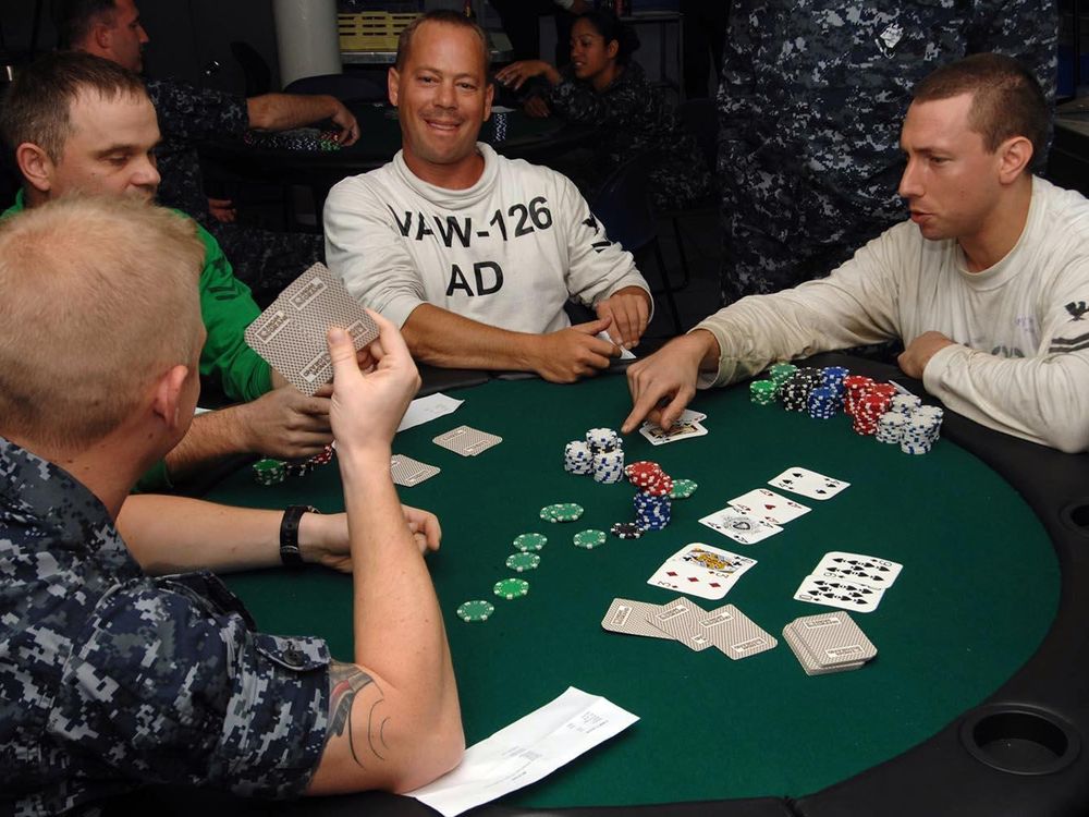 A game of Texas hold 'em in progress. "Hold 'em" is a popular form of poker.