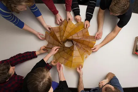 One of Brigham Young University engineering professor Larry Howell's initial origami projects was a solar array that compacted to 9 feet during launch, but deployed to 82 feet across in space to generate power.