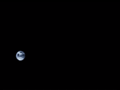 Earth and Moon seen by passing Juno spacecraft 