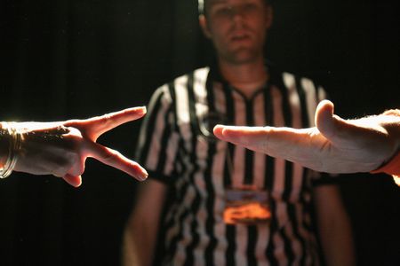 Two contestants compete in the 2006 International World Rock Paper Scissors Championships in Toronto.