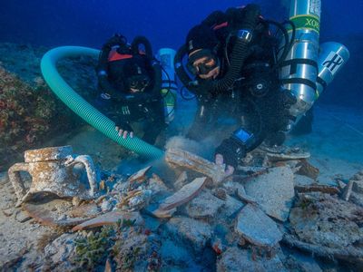Divers examine ceramic artifacts that may hold clues about ancient medicines, perfumes and food.