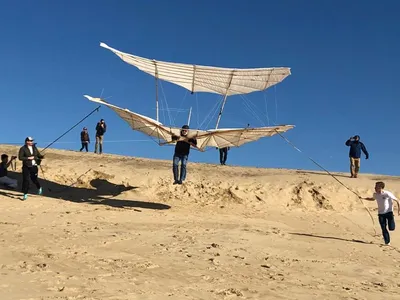 Kitty Hawk Kites founder John Harris flying the Lilienthal glider in December 2019.