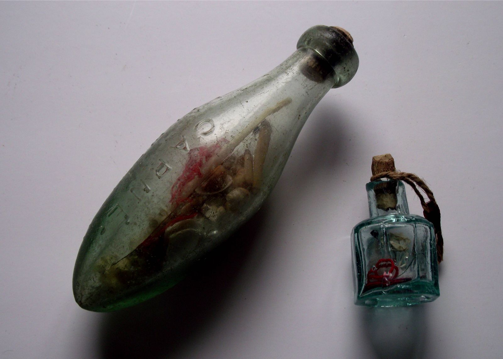 'Witch Bottle' Filled With Teeth, Pins and Mysterious Liquid Discovered in English Chimney