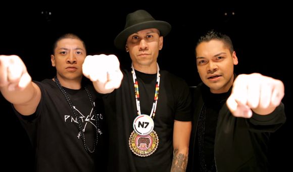 From left to right: Zack “Doc” Battiest, Taboo of the Black Eyed Peas, and Spencer Battiest in the music video 