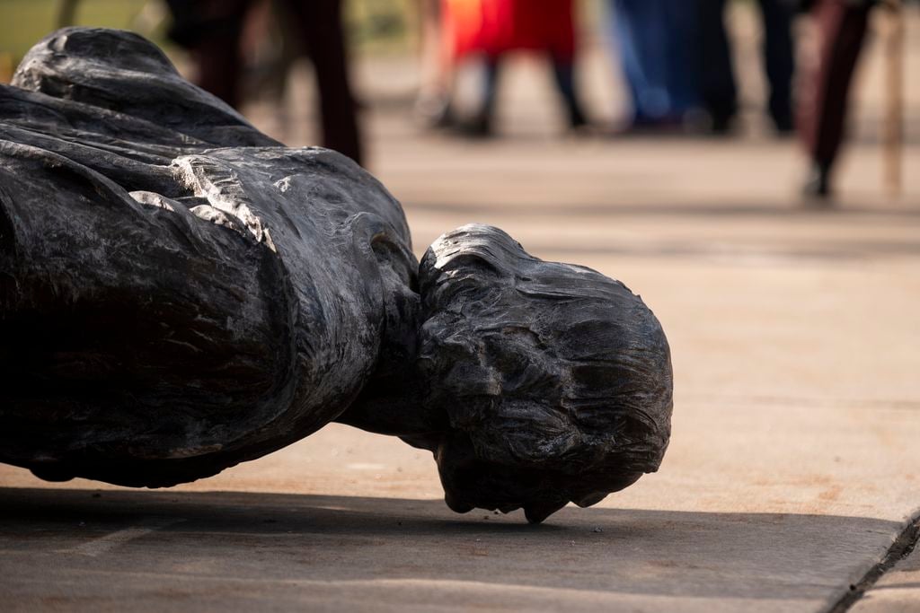 Minnesota statue of Christopher Columbus lies facedown during a protest on June 10, 2020