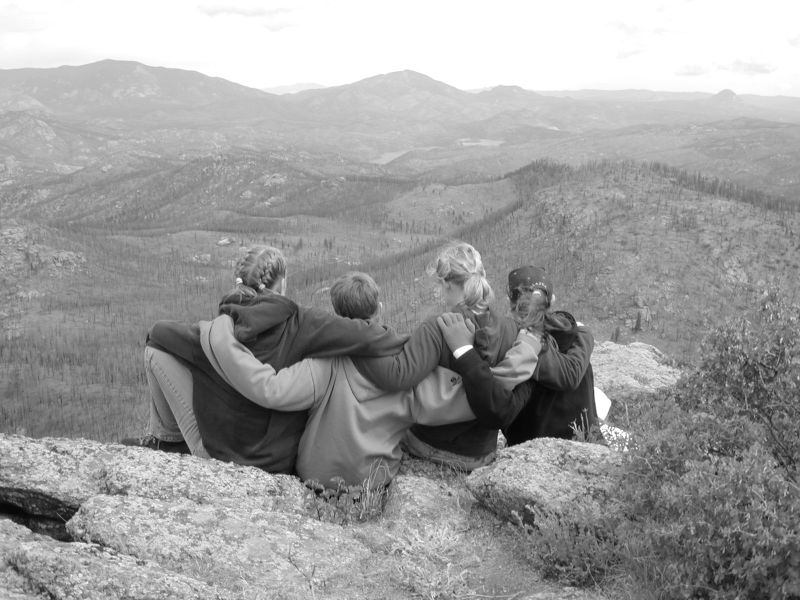 Four friends having a mountaintop experience. Smithsonian Photo