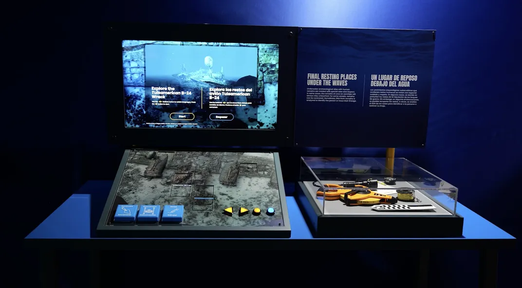Photo of interactive that invites visitors to to simulate the process of excavating and documenting different parts of the Tulsamerican wreck.