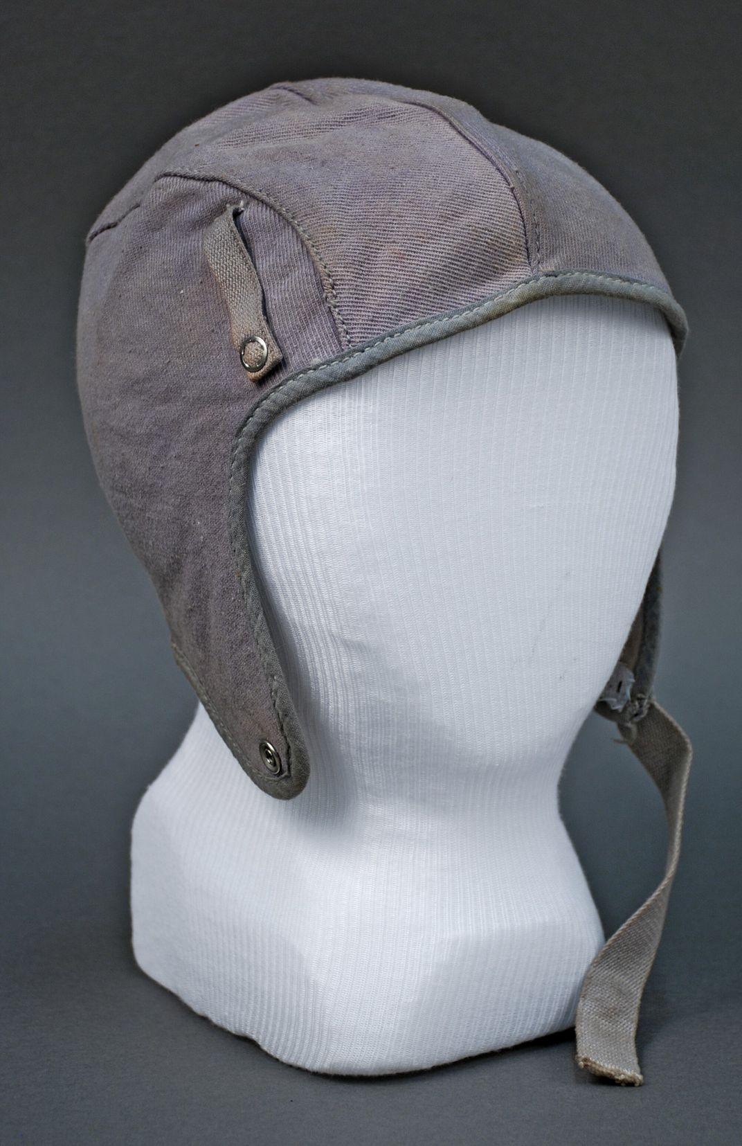 A gray fabric flying cap