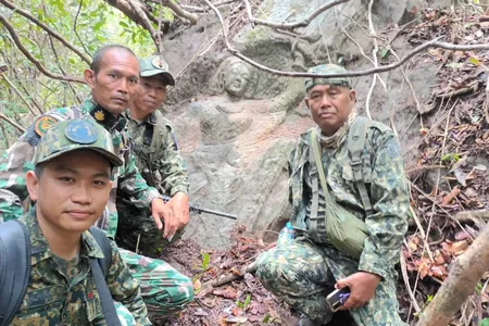 Officials from Thailand&#39;s Department of National Parks, Wildlife and Plant Conservation were sent to investigate the carving.