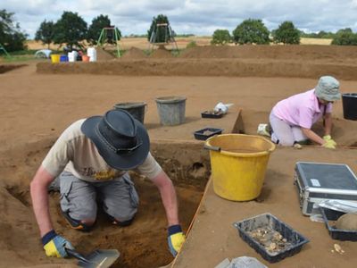 Archaeologists search for artifacts at a dig in Rendlesham, where local craftsmen may have made the items found at the Sutton Hoo burial site.