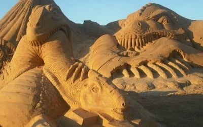 Sand sculpture dinosaurs, as seen in Albufeira, Portugal